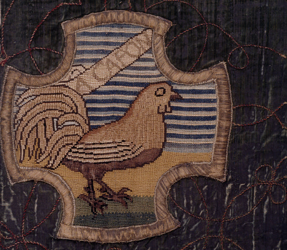 A motif of a capon from the Marian Needlework at Oxburgh Hall