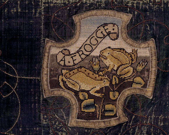 A motif depicting two frogs from the Marian Needlework at Oxburgh Hall