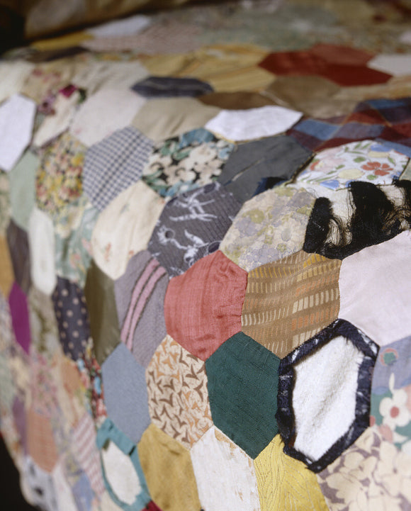 Detail of the patchwork bedspread in Mrs Carlyle's bedroom at at Carlyle's House, 24 Cheyne Row, London, the home of writer Thomas Carlyle and his wife from 1834 to 1881