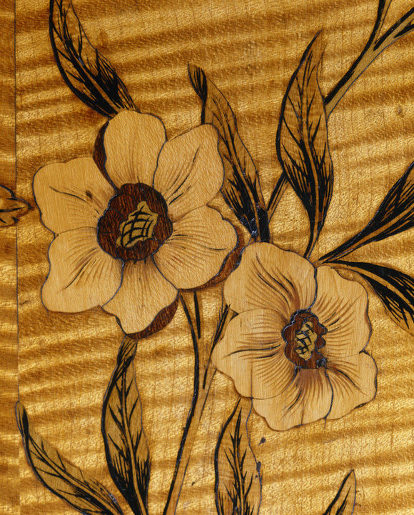 Flower design inlay on an 18th century commode at Nostell Priory