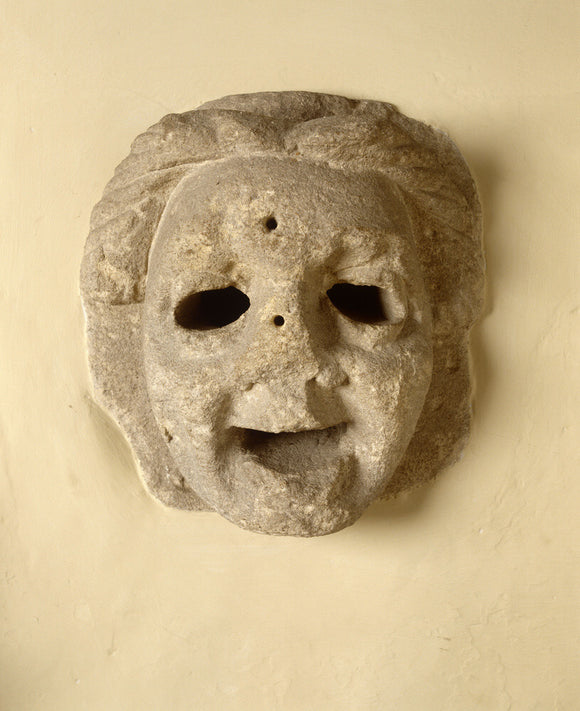 A stone looking-mask squint in the Hall Gallery at Great Chalfield Manor, near Melksham, Wiltshire