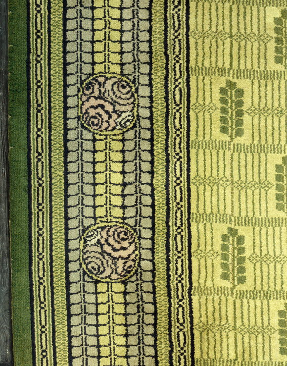 Close view of part of an Axminster carpet in the style of Charles Rennie Mackintosh (1868-1928), in Mr. Lewes' Dressing Room.