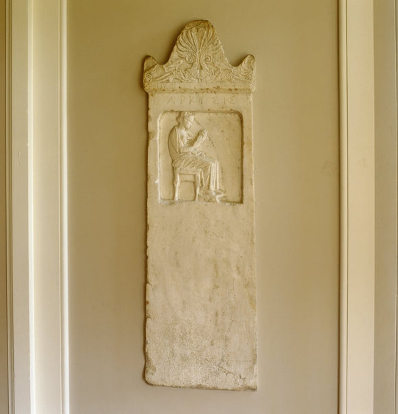 A Greek stele in the window bay of the library at Lyme Park