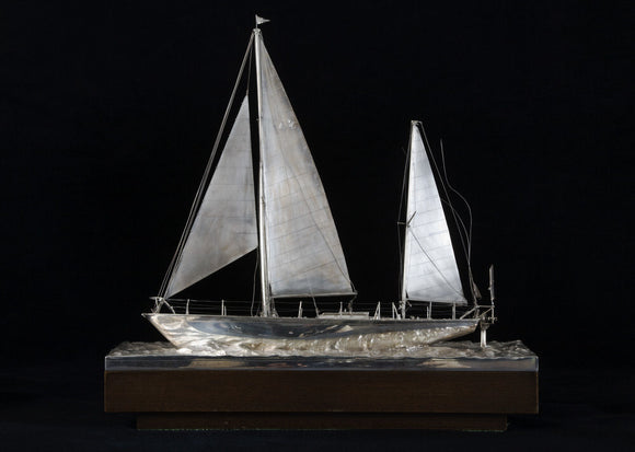 Silver model of the Gypsy Moth IV, Sir Francis Chichester's yacht in which he circumnavigated the world in 1966-7, in the Ante-Room at Arlington Court, Devon