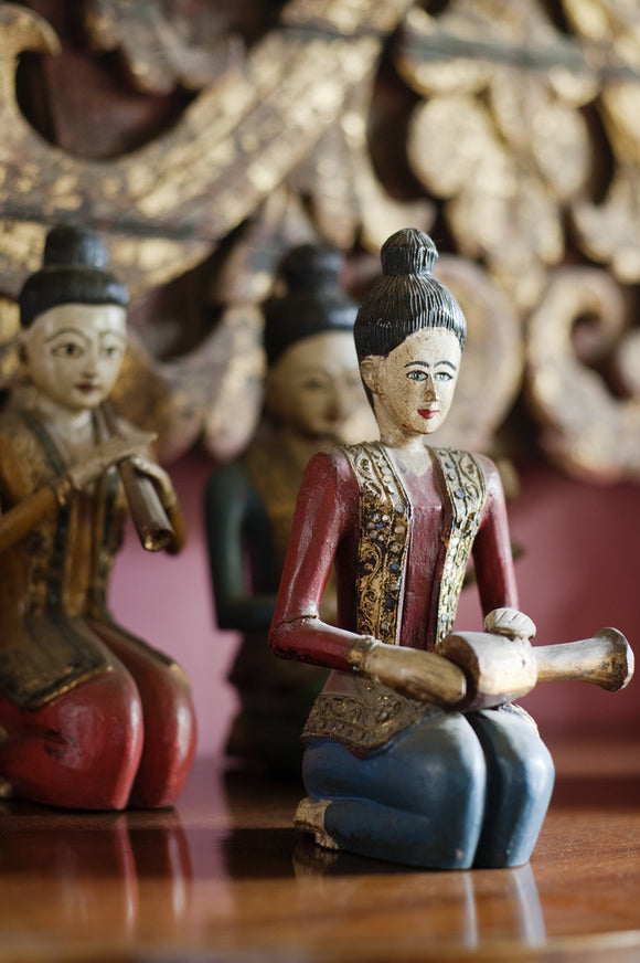 Close view of wooden figurines in the Dining Room at Newark Park, Gloucestershire