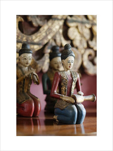 Close view of wooden figurines in the Dining Room at Newark Park, Gloucestershire