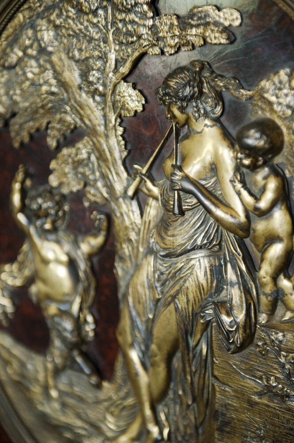 Close view of decoration on a fall-front escritoire in the Drawing Room at Newark Park, Gloucestershire