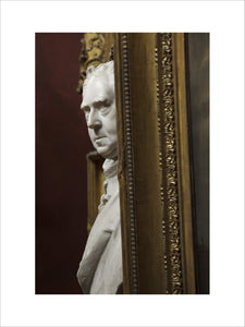 Close view of a sculpture bust and picture frames in the North Gallery at Petworth House, West Sussex