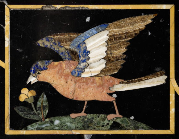 A panel depicting a bird and fruit tree from the pietra dura table in the Entrance Hall at Hinton Ampner, Hampshire