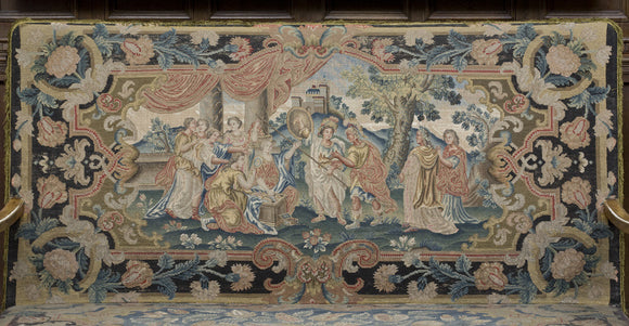 Settee back embroidered in gros and petit point, c.1722, from Chicheley Hall in Buckinghamshire, now in the Parlour at Montacute House, Somerset. The settee has a parcel gilt walnut frame and the embroidery features mythological figures.