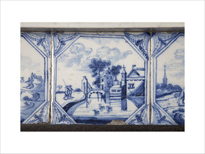 Blue and white Delft tiles in the fireplace surround in the Entrance Hall at Gunby Hall, Lincolnshire