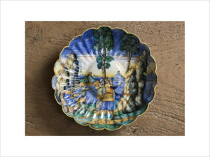 Sixteenth century maiolica dish depicting Moses striking the rock, in the Crimson Bedroom at Montacute House, Somerset