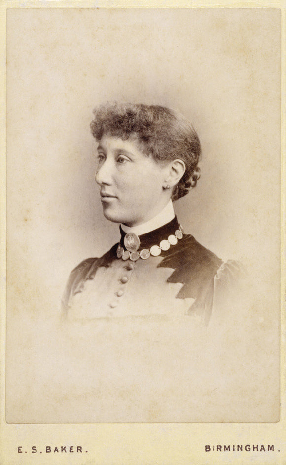 A photograph of Emily Hannah Ash taken in 1885, hanging in the Lookout Room at Packwood House