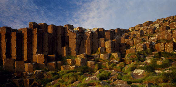 The Giant's Causeway, renowned for its polygonal columns of layered basalt, is the only World Heritage Site in Ireland & results from a volcanic eruption 60 million years ago