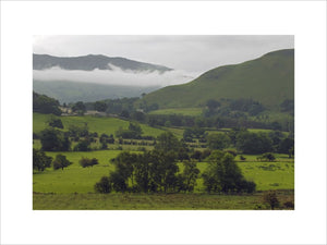 The view east across the lower Newlands Valley on a misty summer morning with Catbells north ridge on the right