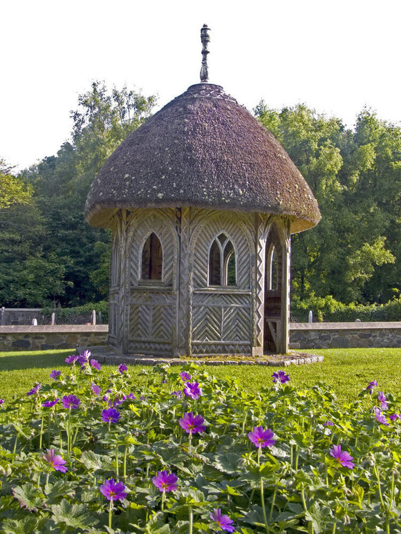 The thatched gazebo in the garden at Finch Foundry