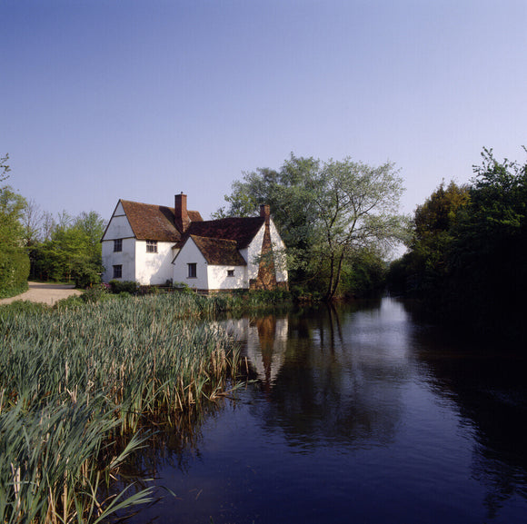 Distant view of Willy Lott's House, early C17th, on the River Stour at Flatford Mill