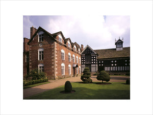 View of the north (black and white frontage) wing and the west front at Rufford Old Hall
