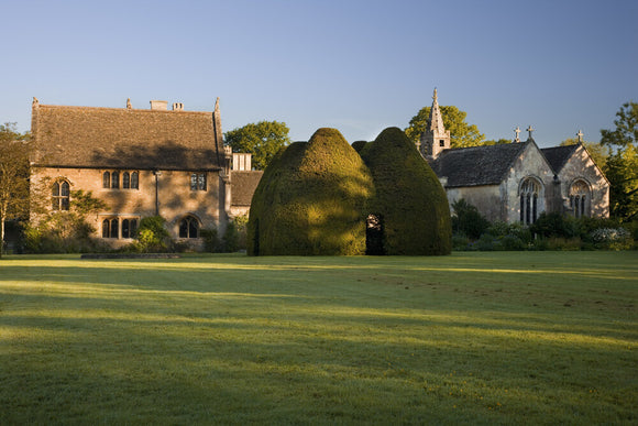 View over the large lawn at the fifteenth-century Great Chalfield Manor, Wiltshire