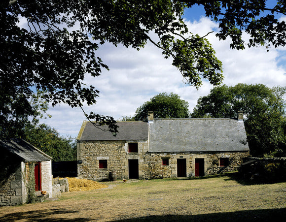 Close view of the birthplace of Thomas Bewick at Cherryburn from across the farmyard