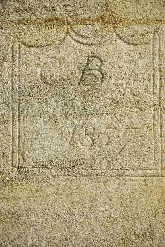 Nineteenth century initials and graffiti etched into the stonework of Lyveden New Bield, Peterborough, Northamptonshire