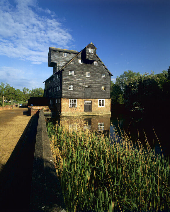 Houghton Mill, a large timber-built watermill, on an island, in the Great Ouse