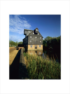 Houghton Mill, a large timber-built watermill, on an island, in the Great Ouse