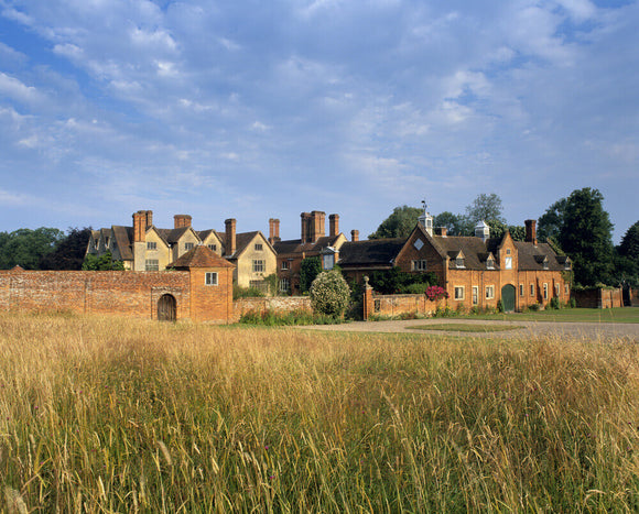 A view over a grassy field of Packwood House, Warwickshire from the east