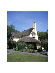 View of an exterior of a cottage at Selworthy in the Holnicote Estate on a sunny day