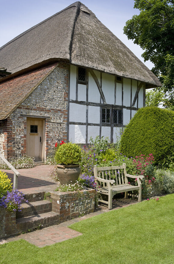 Alfriston Clergy House, a fourteenth-century Wealden hall house in a cottage style garden in East Sussex