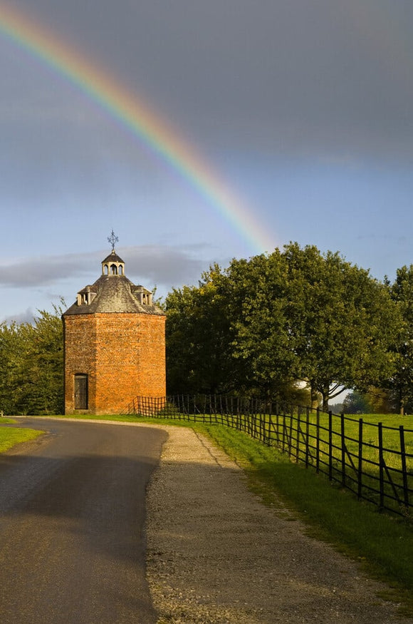 A rainbow above the eighteenth-century dovecote at Erddig, Wrexham, Wales