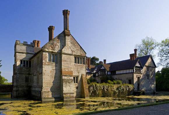View across the moat towards the Gatehouse at Baddesley Clinton, Warwickshire