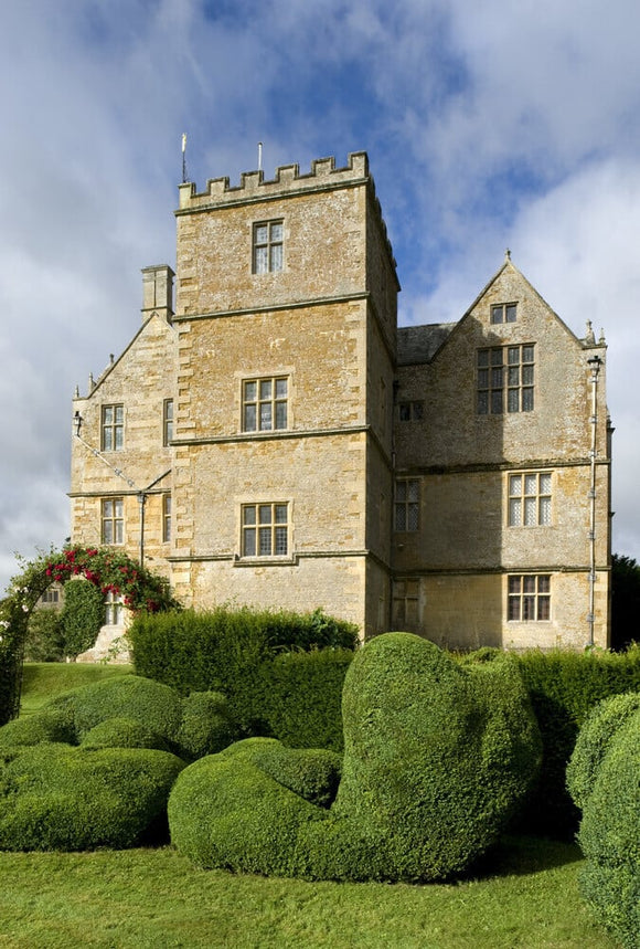 The unusual topiary shapes in front of the east front of Chastleton House, Oxfordshire