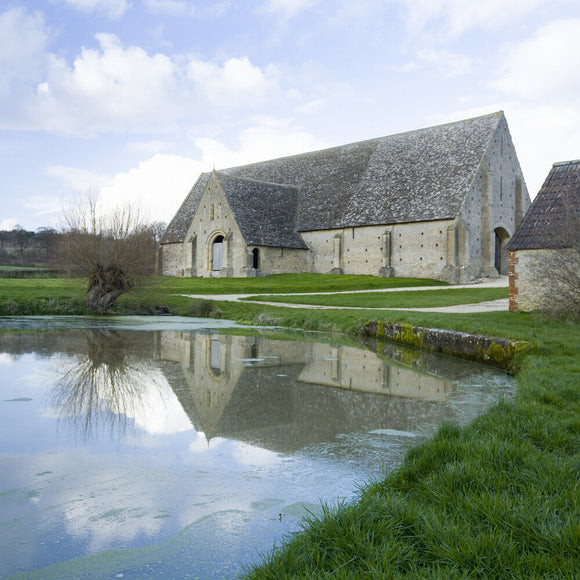 The Great Barn at Great Coxwell, a thirteenth-century Cistercian monastic barn with a stone-tiled roof, Oxfordshire