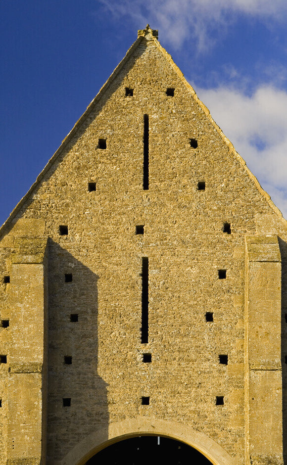 Close view of the end of the mid-thirteenth century monastic Great Coxwell Barn near Faringdon in Oxfordshire