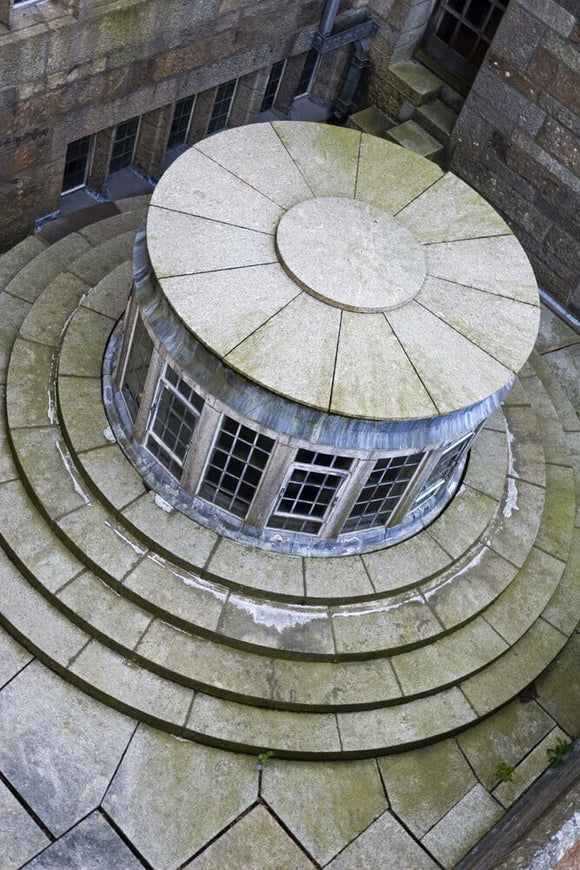A view from the roof down to the circular kitchen lantern at Castle Drogo, Devon