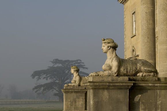 The pair of Coade sphinxes guarding the southern portico at Croome Court, Croome Park, Worcestershire