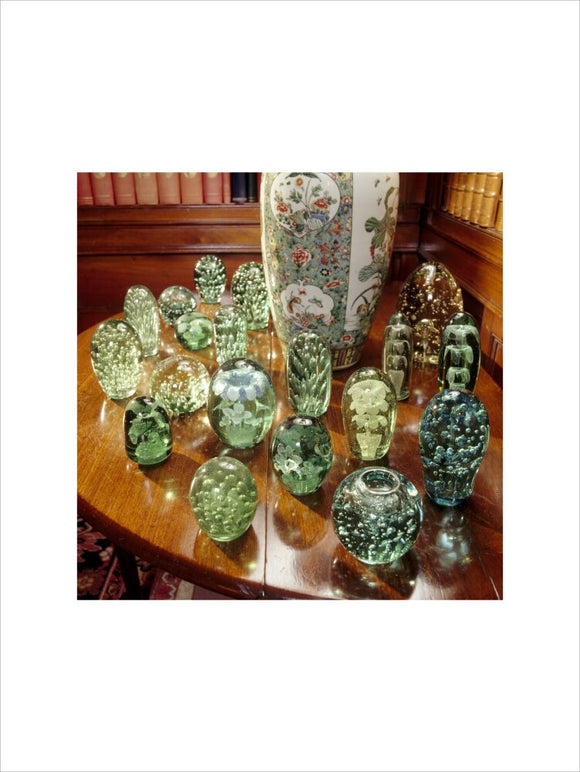 Collection of glass doorstops and paperweights