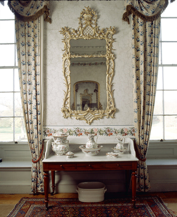 View of the mirror and wash-stand in the Rose Bedroom at Felbrigg Hall