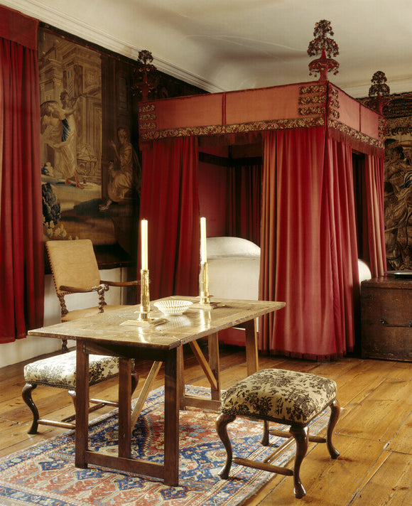 View of the Red Room, with the bed curtains and valances dating from c. 1670
