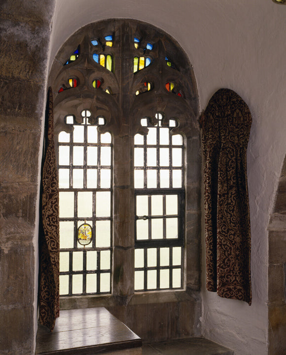 A close-up view of the neo-gothic traceried window and curtain, introduced by Lutyens