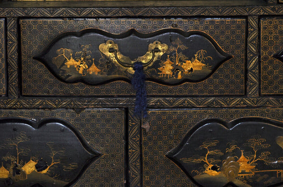 Close view of one of the drawers in a Japanese Buddhist shrine or Butsudan cabinet, part of the Charles Wade collection in the Green Room at Snowshill Manor