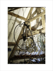 A penny-farthing bicycle, part of the collection of Charles Wade in Hundred Wheels at Snowshill Manor