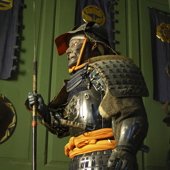 Close view of part of the remarkable collection of Japanese Samurai armour from the C17th to C19th, in the Green Room at Snowshill Manor