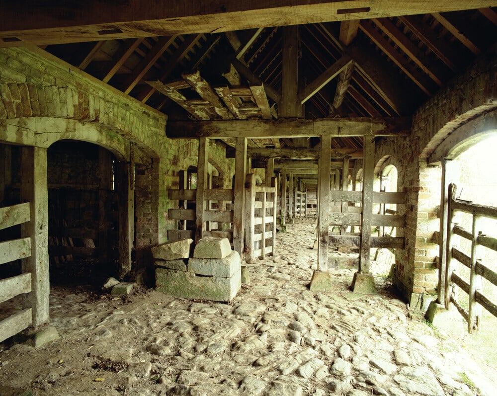 Interior of delightful old stabel block with cobbled floor at Barringt ...
