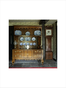 A local carved oak press cupboard at Hill Top, bought by Beatrix at a local farm sale