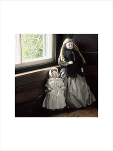 Shown on the window ledge in the bedroom at Hill Top are two French dolls which Beatrix said had belonged to her as a child although 'the shot silk dress is older'