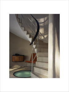The striking central spiral staircase in The Homewood