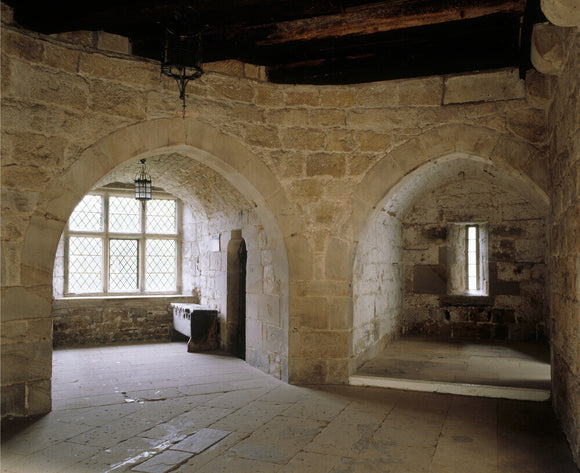 View of two arched chambers in Adam's Tower at Chirk Castle showing a square mullioned window of c 1600