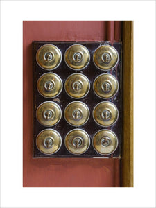 Brass light switches on the Staircase at Hughenden Manor, Buckinghamshire, home of prime minister Benjamin Disraeli between 1848 and 1881
